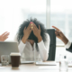woman with head down attorneys aregumantative